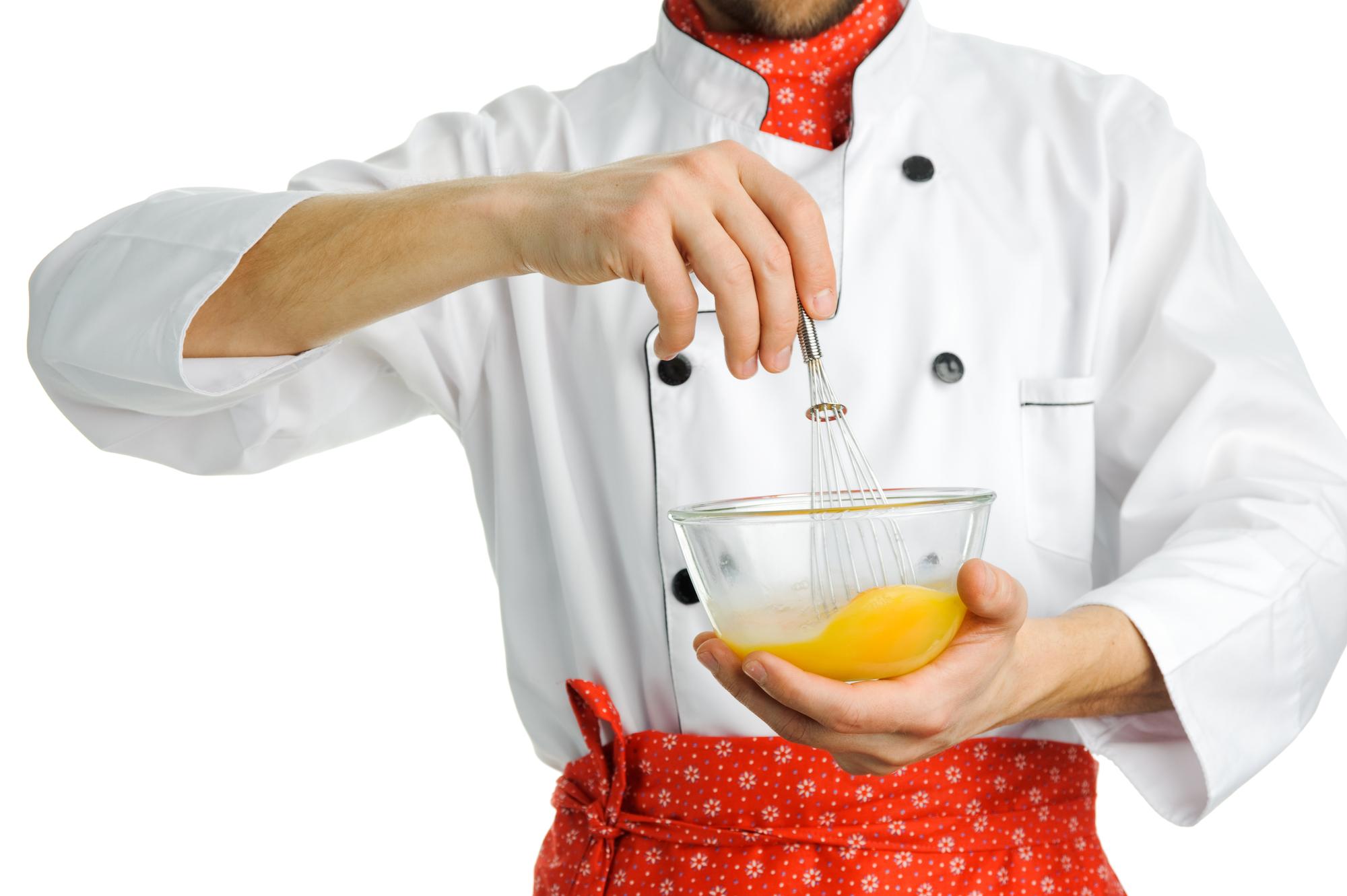 Chef hands arranging garnish